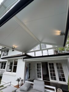 Electrician installing alfresco lights at a home in Epping NSW